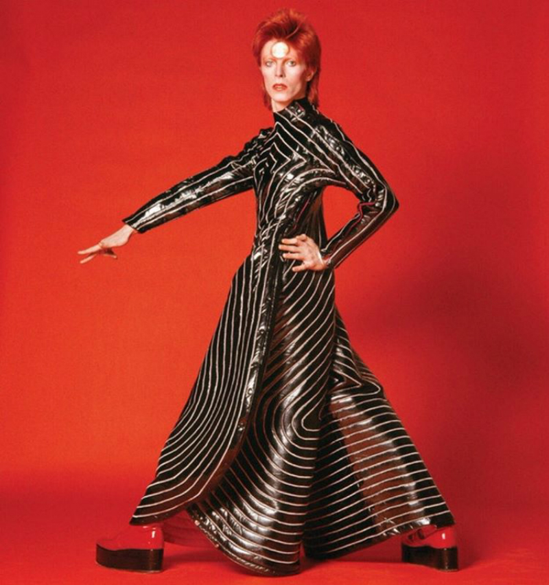 David Bowie fashion influence red background sequin jumpsuit - INDIE ...