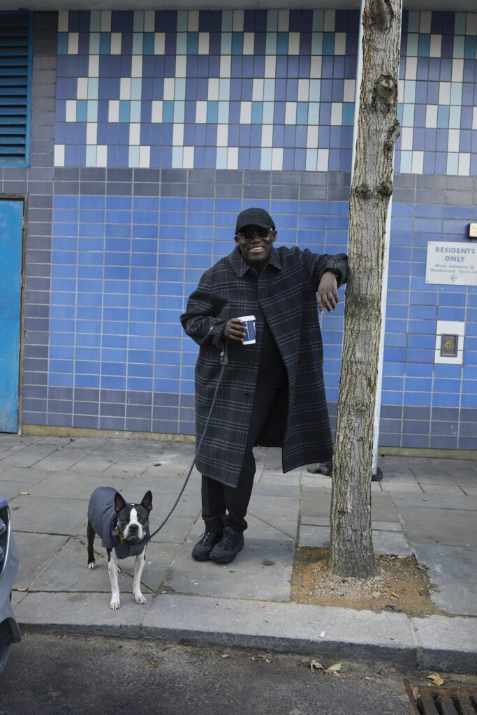 Edward Enninful stops for coffee on a walk with his dog, Ru