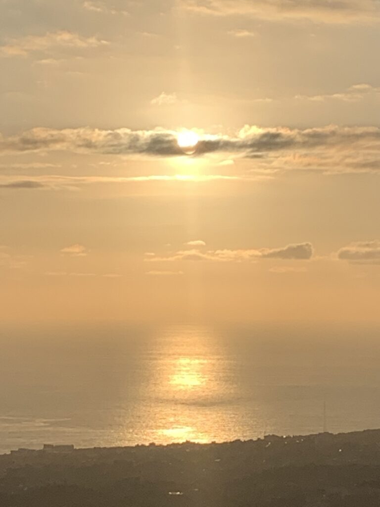 Aesthetically low-quality photo of a sunset over the sea